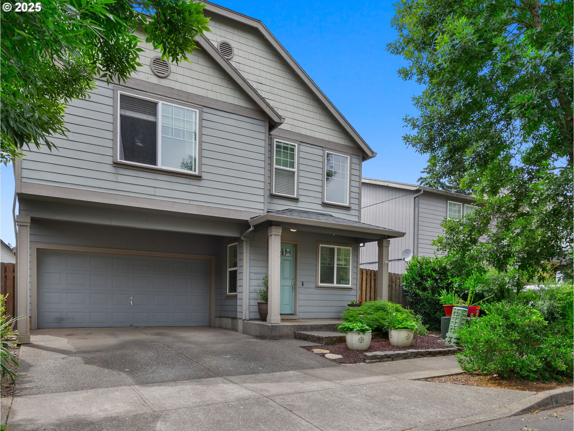 18019 Carlson Avenue Sandy, OR 97055 - Photo 1 of 23 a front view of a house with garden