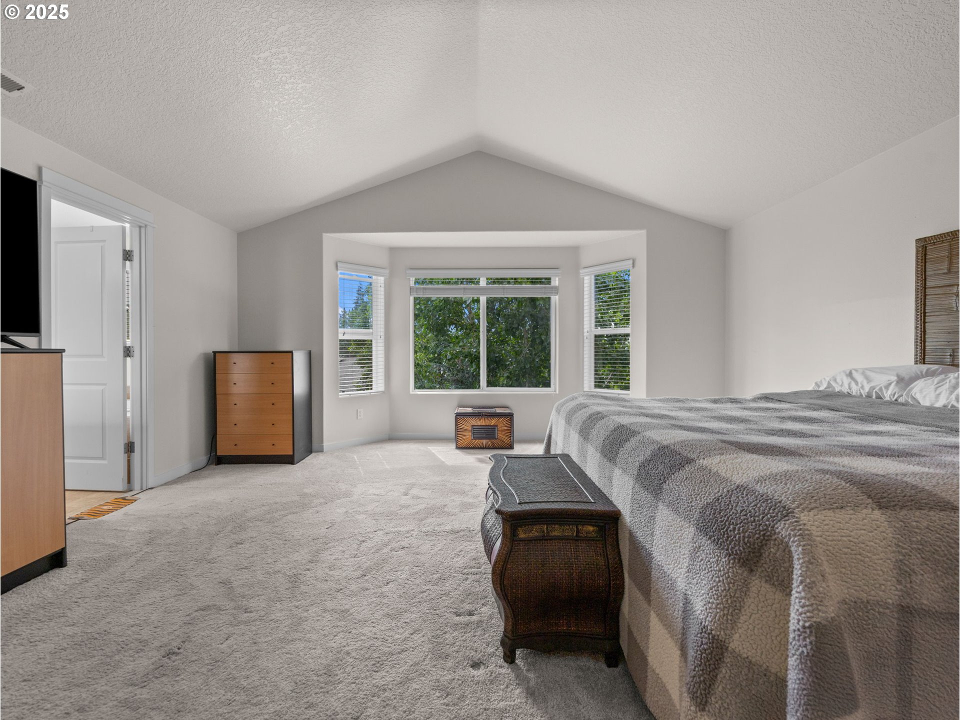 18019 Carlson Avenue Sandy, OR 97055 - Photo 14 of 23 a bedroom with a bed and large window