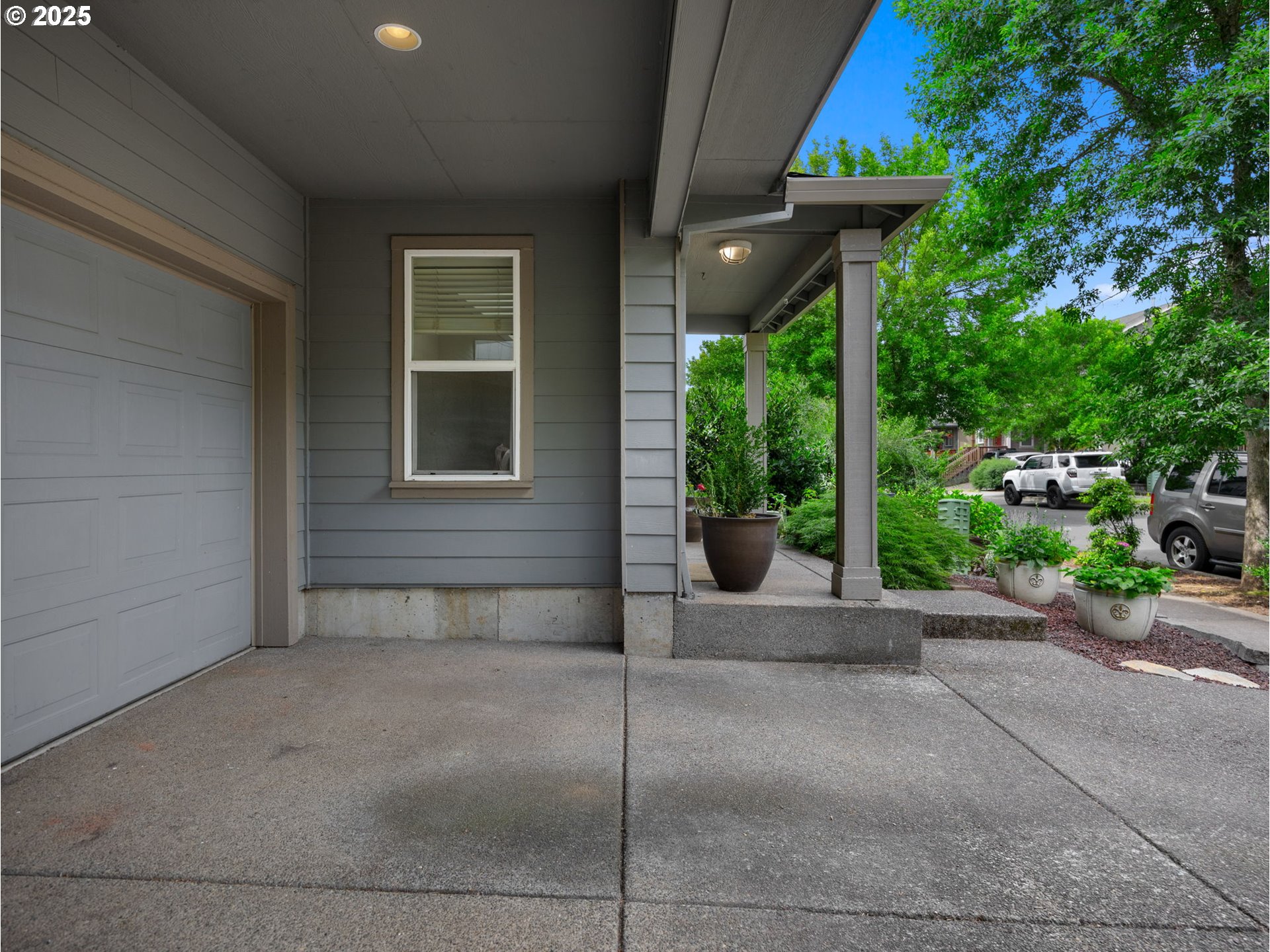 18019 Carlson Avenue Sandy, OR 97055 - Photo 3 of 23 a view of a house with porch and garden