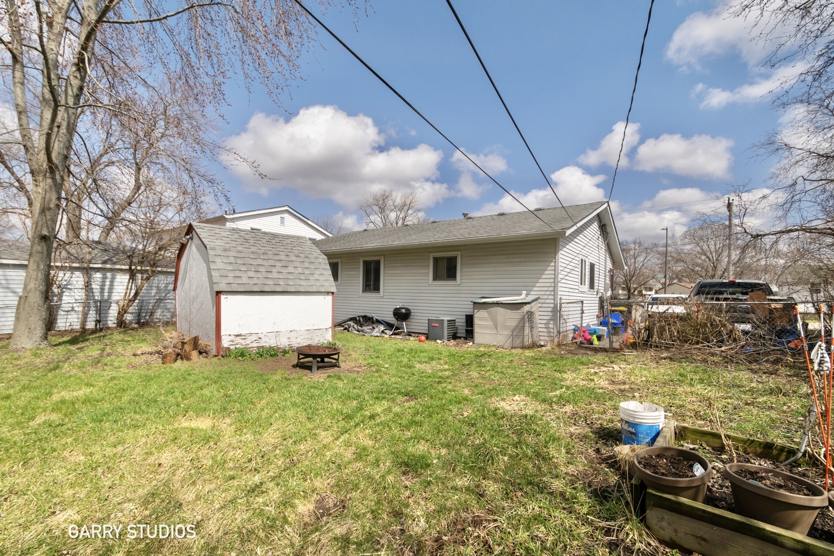 306 South Oltendorf Road Streamwood, IL 60107 - Photo 15 of 15 a view of a house with backyard porch and sitting area
