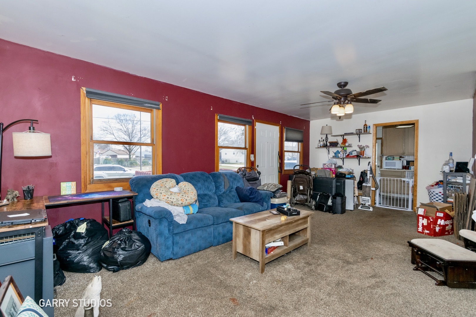 306 South Oltendorf Road Streamwood, IL 60107 - Photo 2 of 15 a living room with furniture and a large window