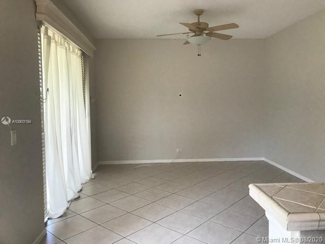15751 Southwest 20th Street Miramar, FL 33027 - Photo 16 of 34 a view of an empty room with a window