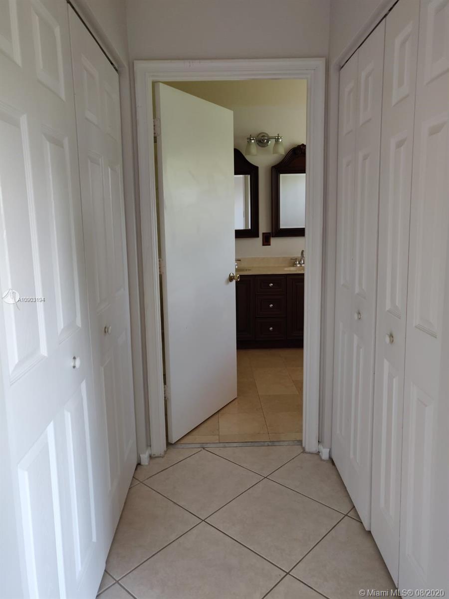 15751 Southwest 20th Street Miramar, FL 33027 - Photo 22 of 34 a view of a bathroom from the hallway