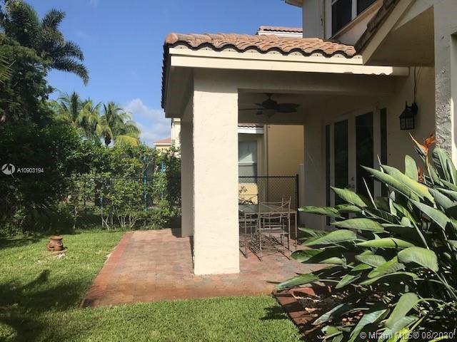 15751 Southwest 20th Street Miramar, FL 33027 - Photo 29 of 34 a front view of a house with garden
