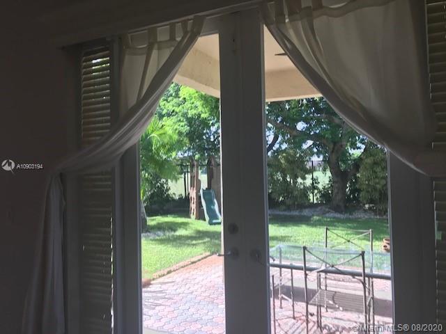 15751 Southwest 20th Street Miramar, FL 33027 - Photo 32 of 34 a view of a porch with a yard