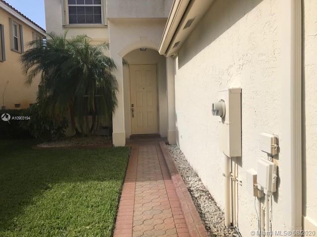 15751 Southwest 20th Street Miramar, FL 33027 - Photo 4 of 34 a view of a backyard of the house