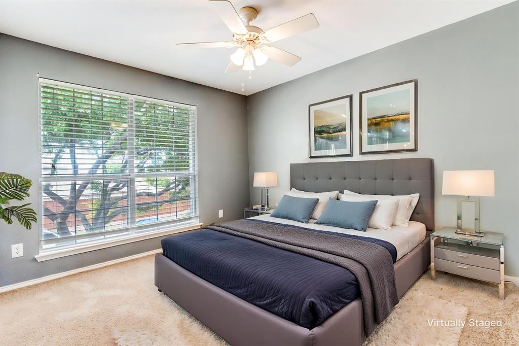 1445 Berkley Road Allen, TX 75002 - Photo 22 of 30 Overlooking the front yard, this secondary bedroom has a soothing vibe, ceiling fan and good closet space.