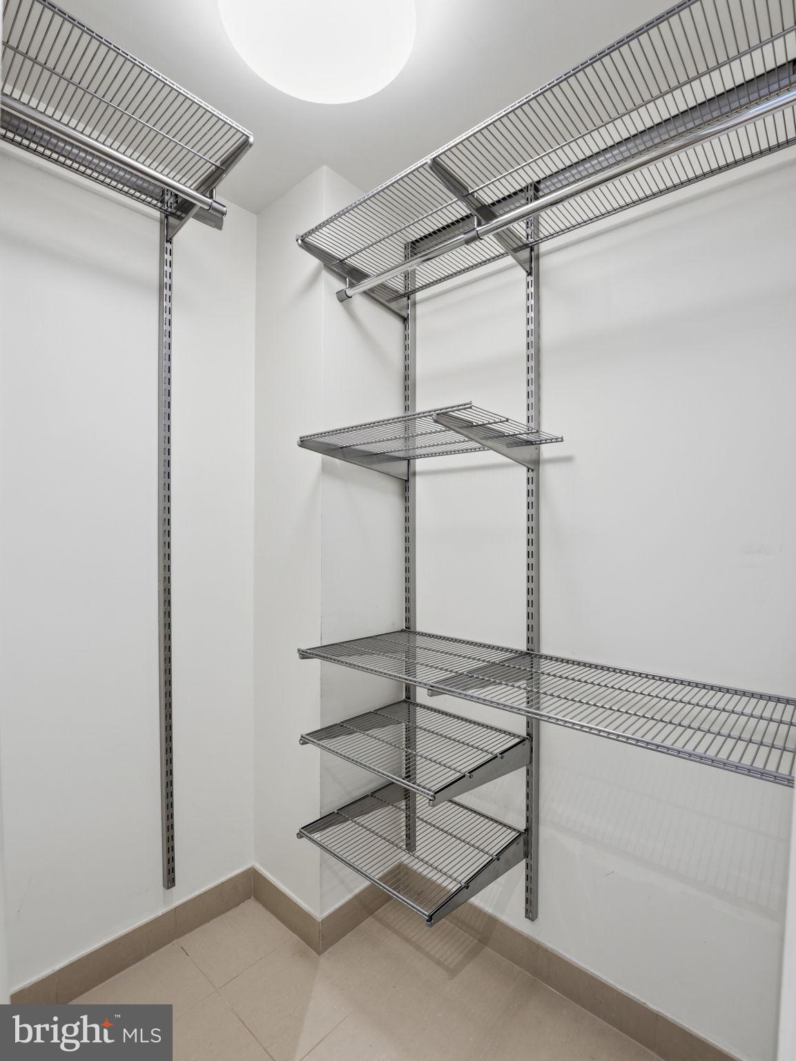 1515 15th Street Northwest, Unit 403 Washington, DC 20005 - Photo 16 of 26 Lofted Primary Suite | Walk-in Closet