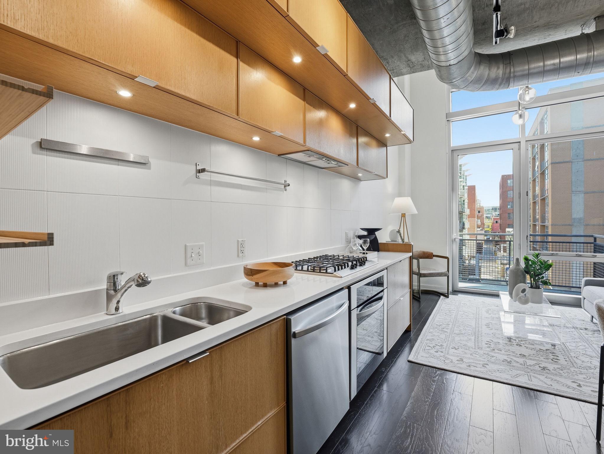 1515 15th Street Northwest, Unit 403 Washington, DC 20005 - Photo 7 of 26 Gourmet Kitchen with Custom Cabinetry.