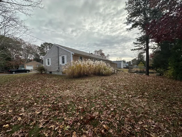 a backyard of a house with lots of green space