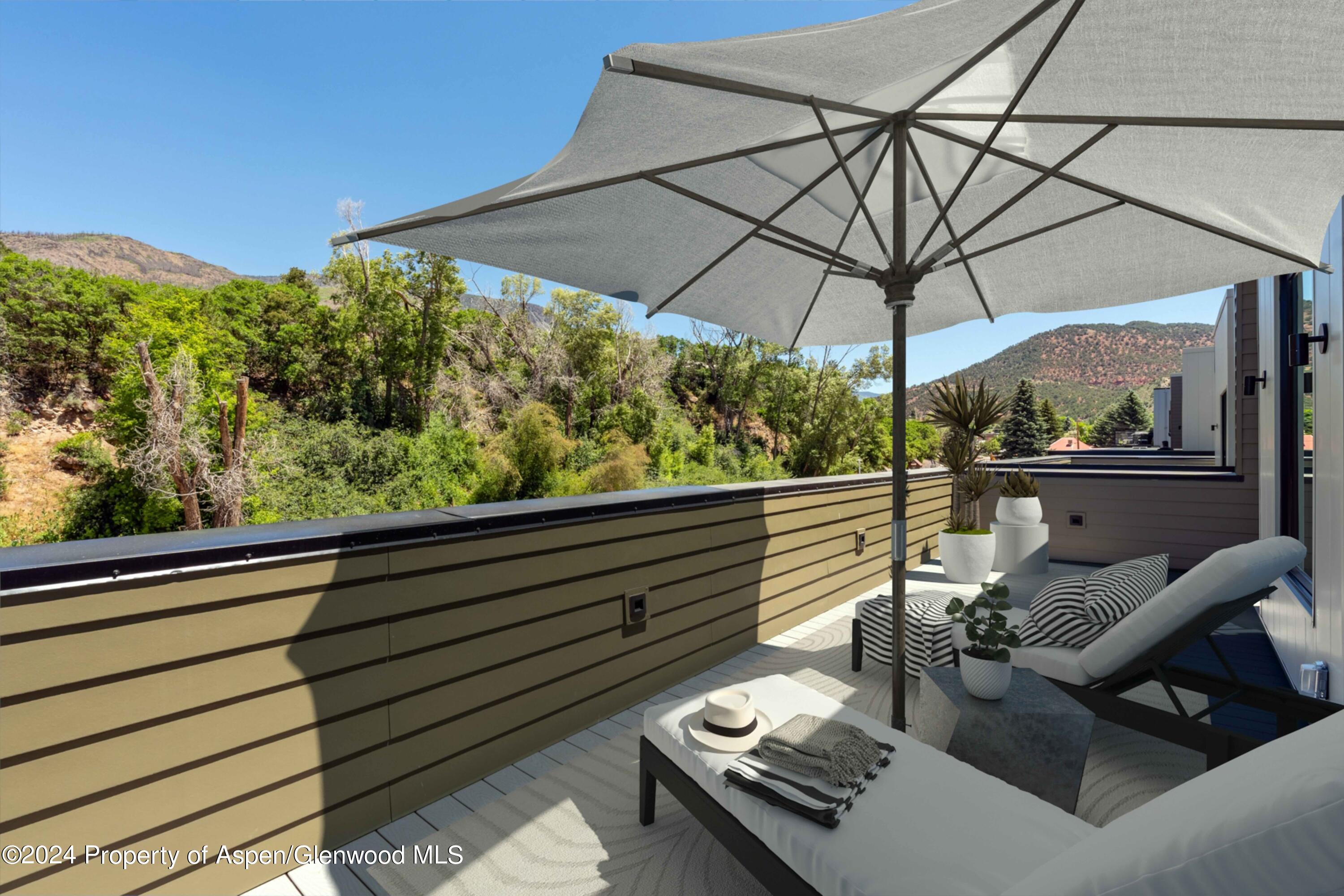 22840 Two Rivers Road, Unit 300 Basalt, CO 81621 - Photo 19 of 28 a outdoor view with a sitting space