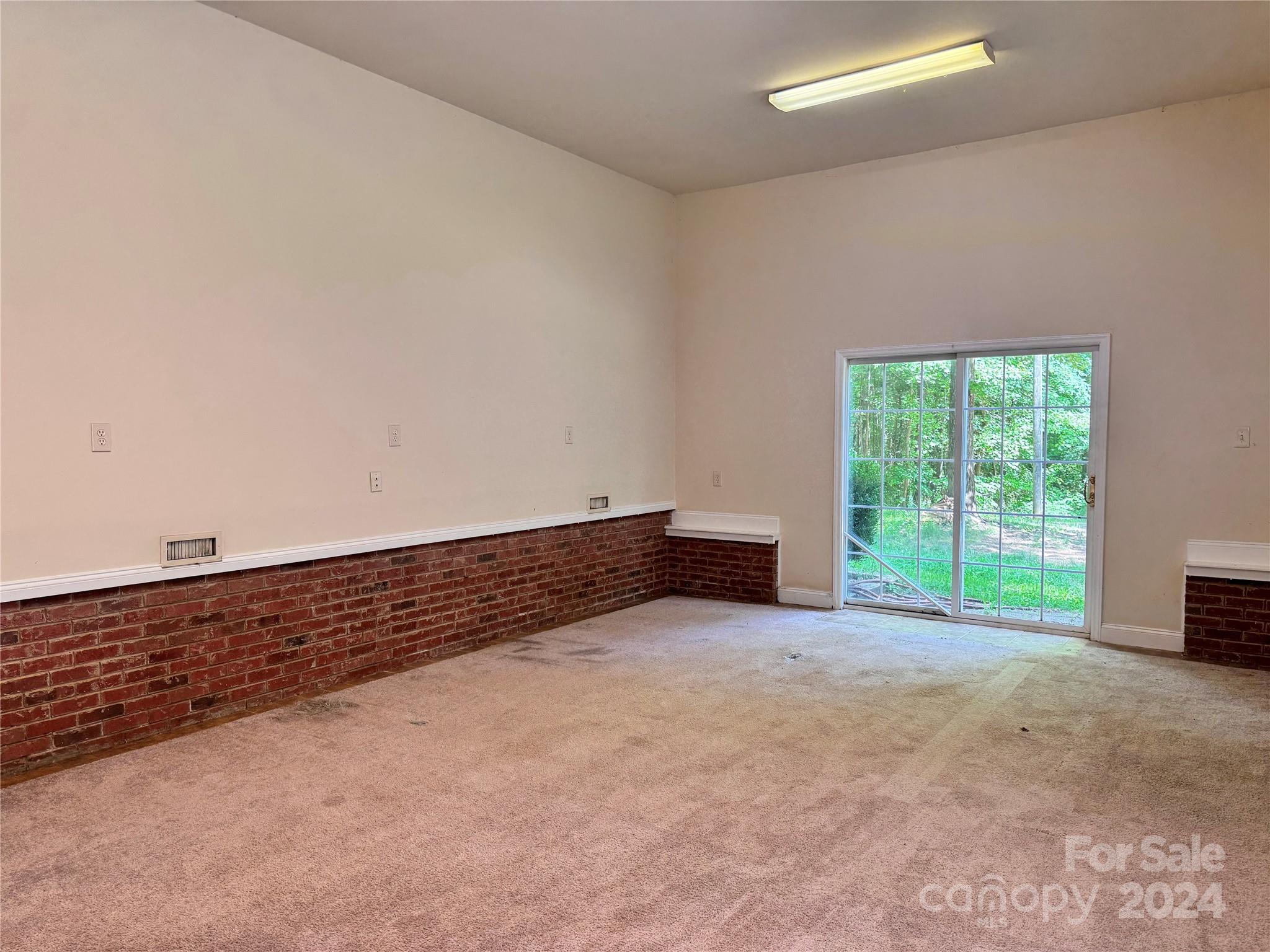 1989 Burkin Road McConnells, SC 29726 - Photo 8 of 20 a view of an empty room and window
