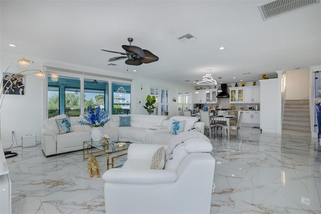 3271 Hibiscus Drive Hernando Beach, FL 34607 - Photo 23 of 95 a living room with furniture and a large window
