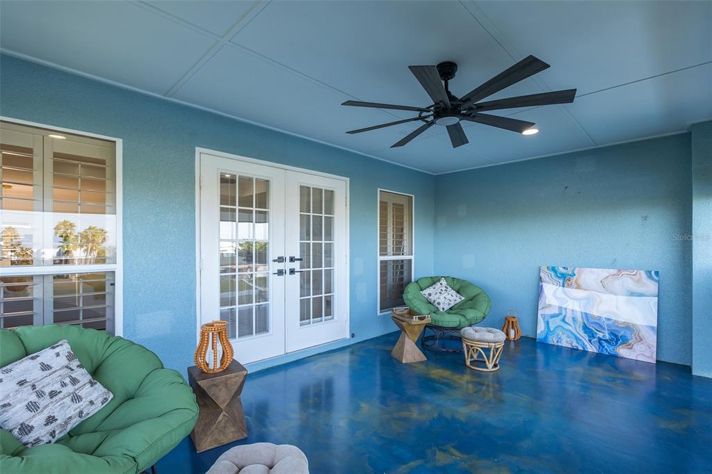 3271 Hibiscus Drive Hernando Beach, FL 34607 - Photo 32 of 95 a living room with furniture and wooden floor
