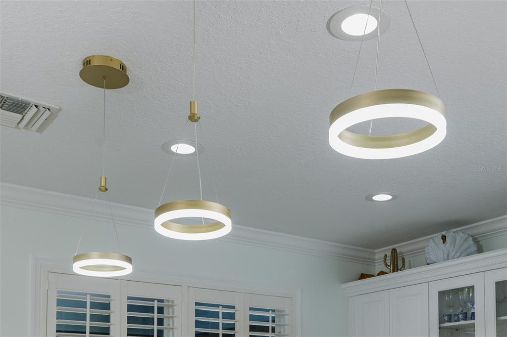 3271 Hibiscus Drive Hernando Beach, FL 34607 - Photo 43 of 95 a bathroom with a toilet sink and mirror