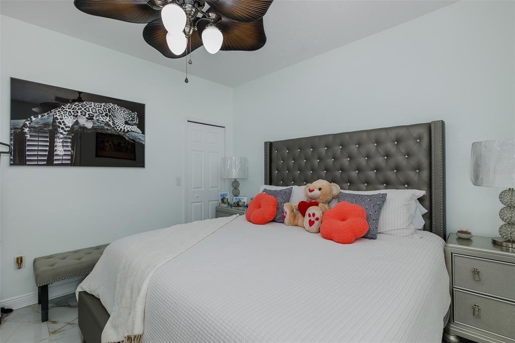 3271 Hibiscus Drive Hernando Beach, FL 34607 - Photo 67 of 95 a bedroom with a bed and dresser