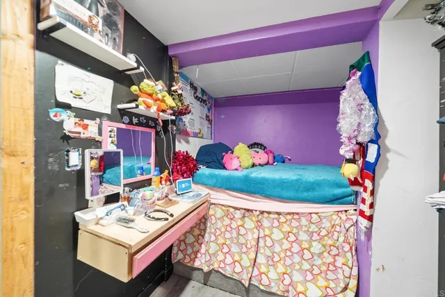 a table and chairs in front of a door