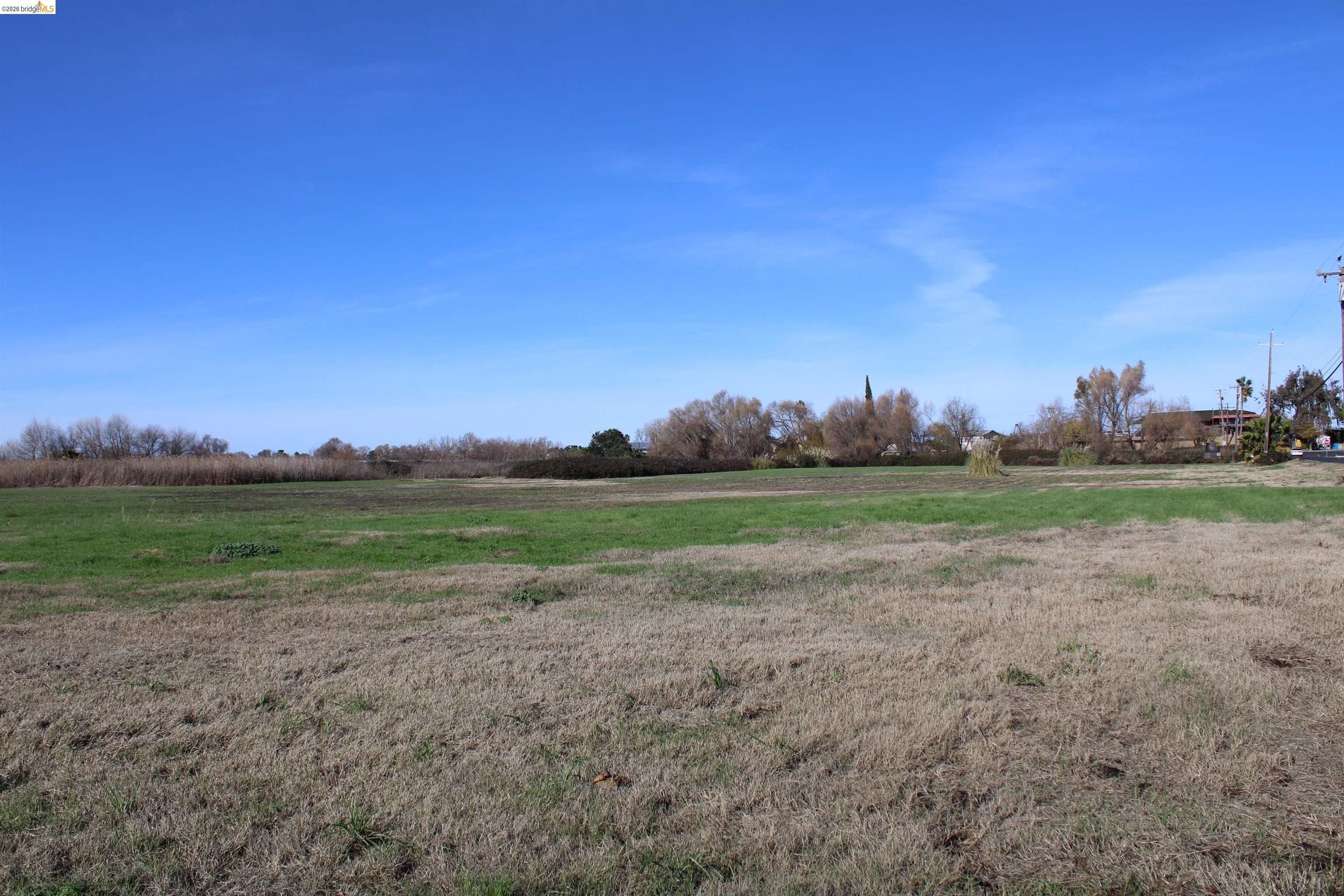 0 Willow Road Bethel Island, CA 94511 - Photo 5 of 6 a view of a field with ocean view
