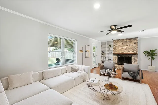 a living room with furniture or fireplace and a large window