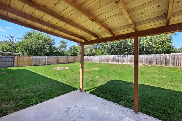 a view of a backyard with a garden