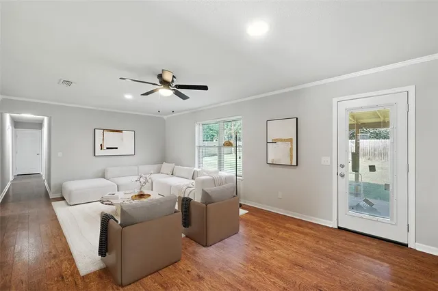 a living room with furniture and a window