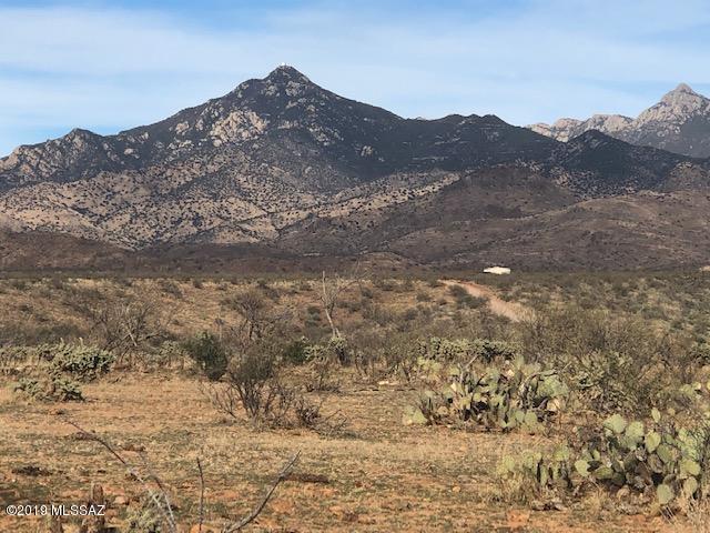 Tbd Tbd Camino Josefina, Unit 52 Rio Rico, AZ 85648 - Photo 1 of 10 a view of a dry yard with mountains in the background