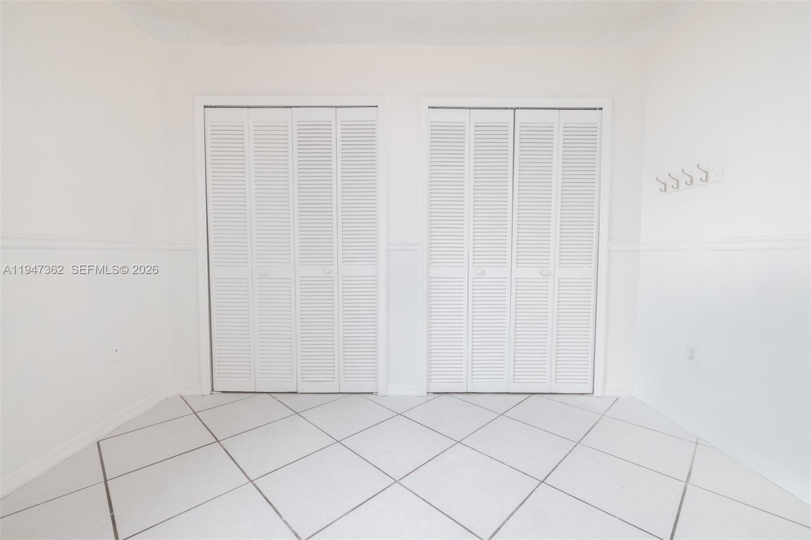 16244 Southwest 81st Street Miami, FL 33193 - Photo 28 of 35 a view of a utility room with wooden floor