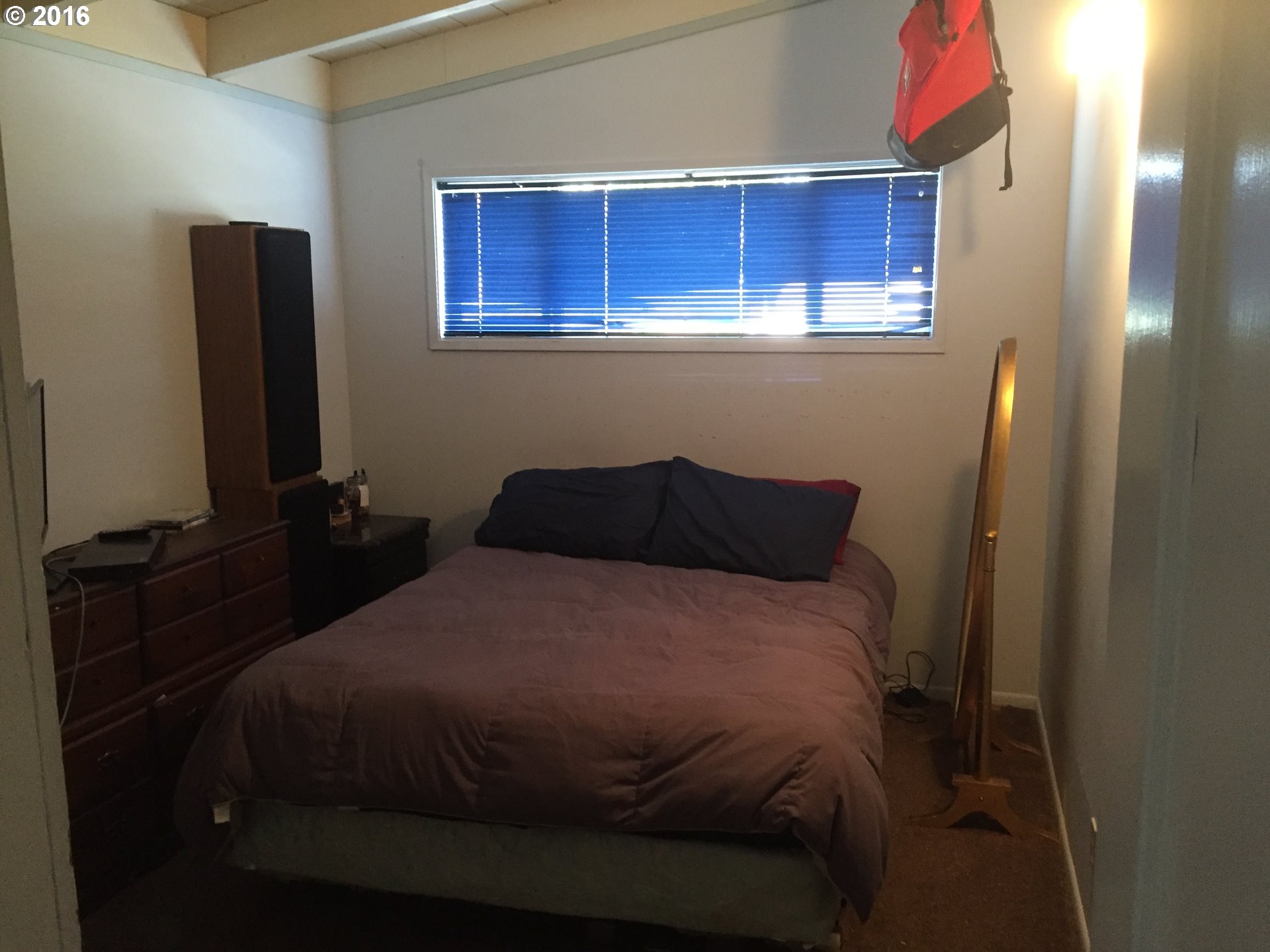 1609 Nevada Street The Dalles, OR 97058 - Photo 13 of 24 a bedroom with a bed and a dresser