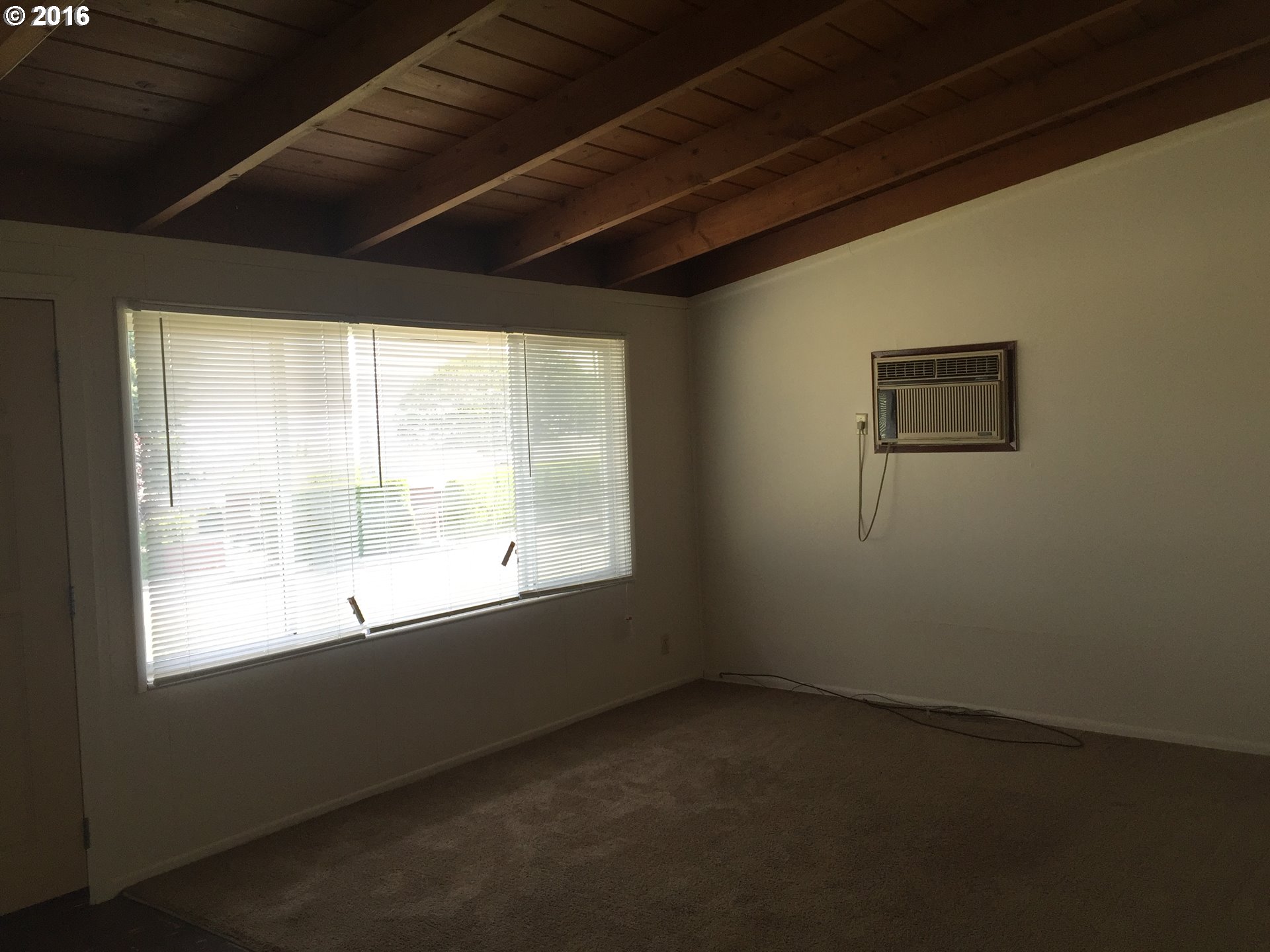 1609 Nevada Street The Dalles, OR 97058 - Photo 6 of 24 a view of empty room with window