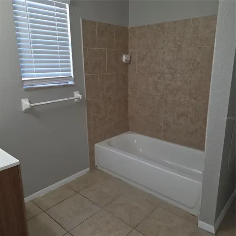 a bathroom with a bathtub