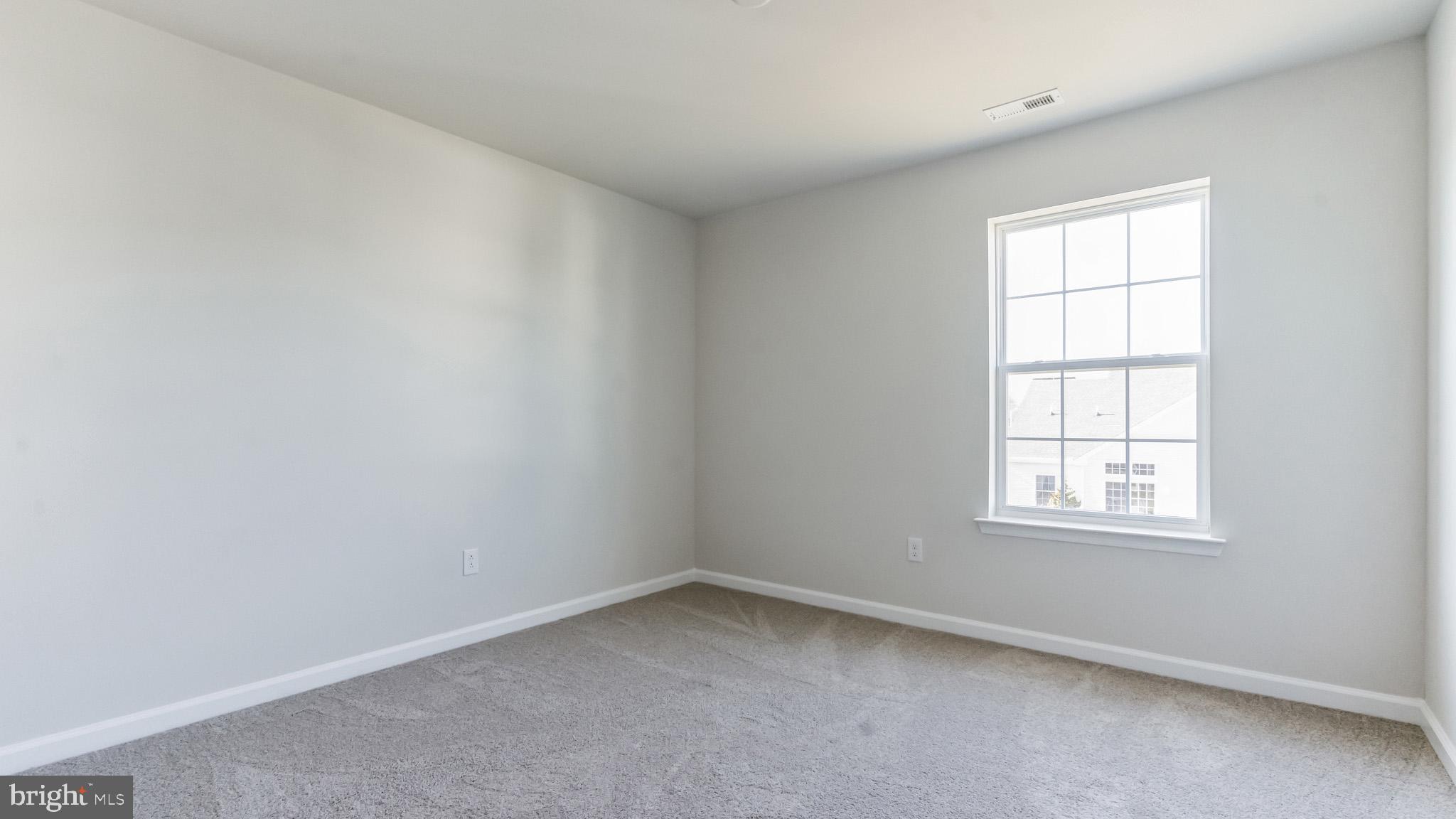 423 Kingston Drive Cherry Hill, NJ 08034 - Photo 16 of 27 an empty room with a window