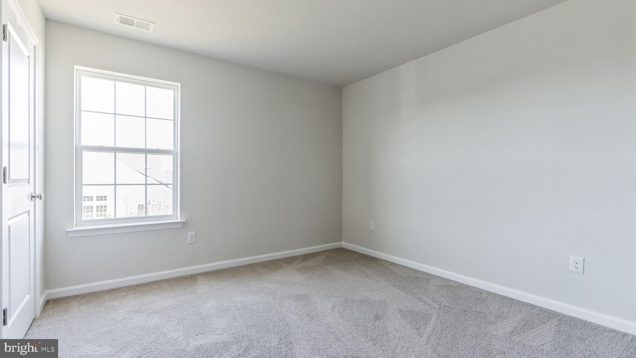 423 Kingston Drive Cherry Hill, NJ 08034 - Photo 22 of 27 an empty room with a window