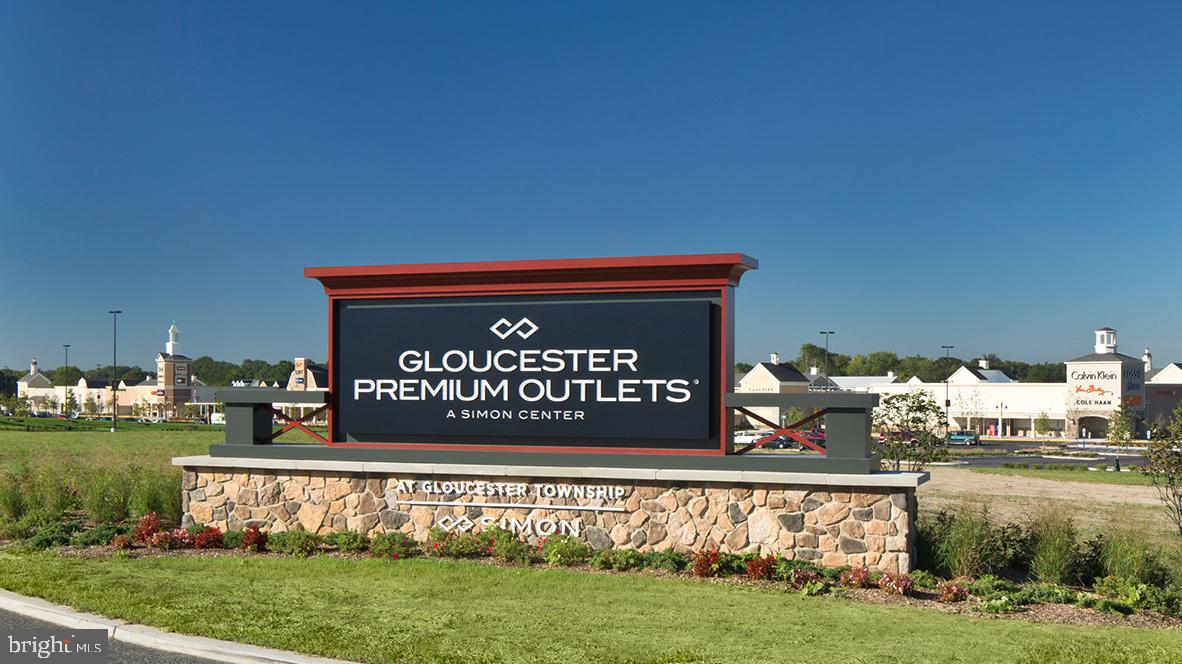 423 Kingston Drive Cherry Hill, NJ 08034 - Photo 26 of 27 a sign on the side of the river