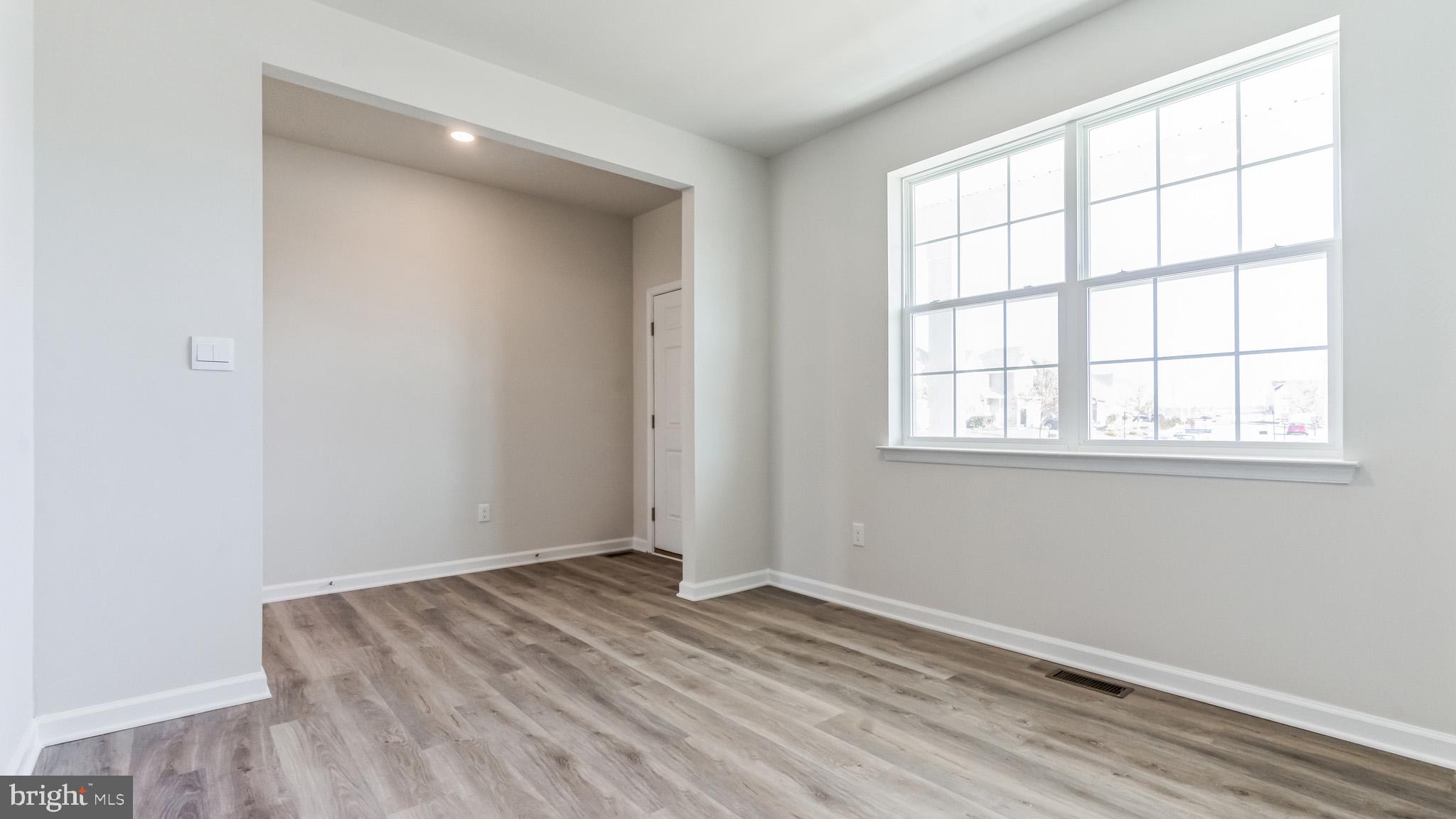 423 Kingston Drive Cherry Hill, NJ 08034 - Photo 5 of 27 an empty room with a window