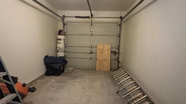 a view of storage and utility room with racks on the wall
