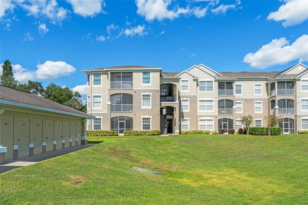582 Brantley Terrace Way, Unit 109 Altamonte Springs, FL 32714 - Photo 1 of 1 a front view of a house with a yard