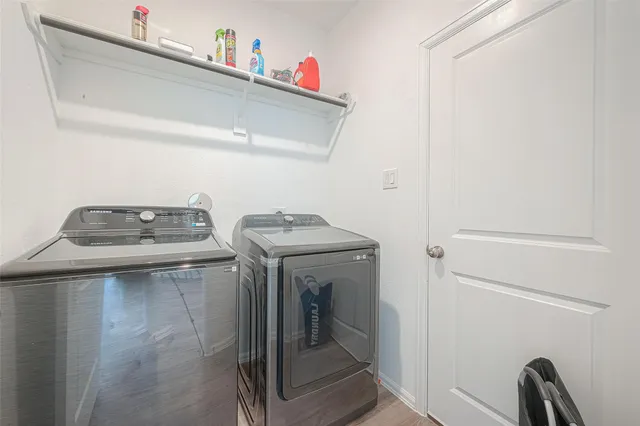 a utility room with dryer and washer
