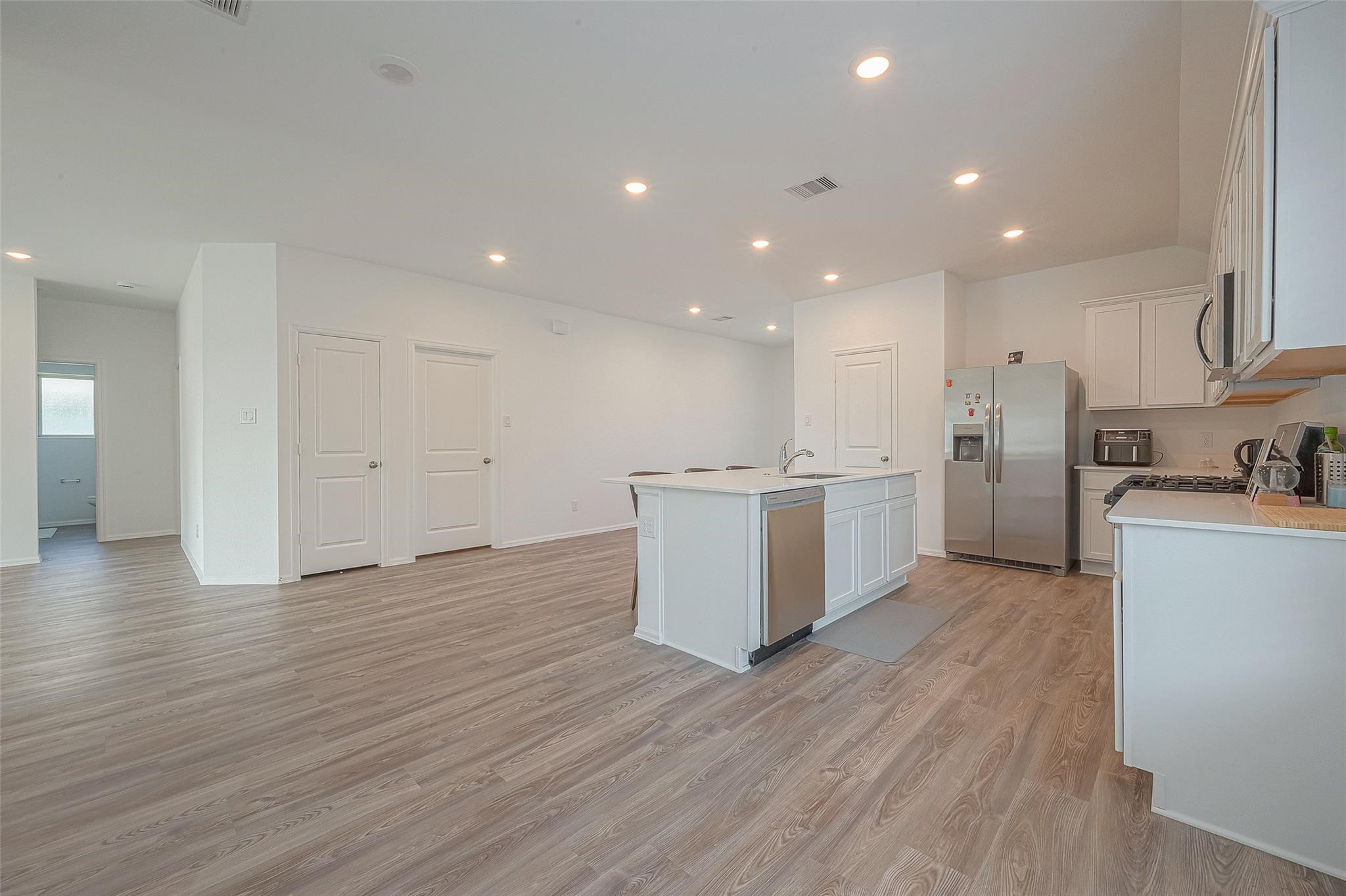 5528 Knox Landing Drive Rosenberg, TX 77469 - Photo 6 of 20 a view of kitchen with wooden floor
