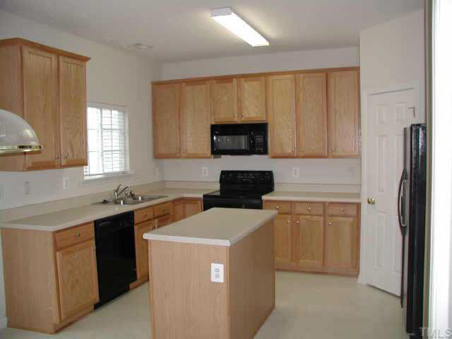 2403 Gaheris Court Raleigh, NC 27614 - Photo 2 of 10 Large cooks kitchen with 42' cabinets and island. Includes the Refrigerator and a huge pantry. Other
