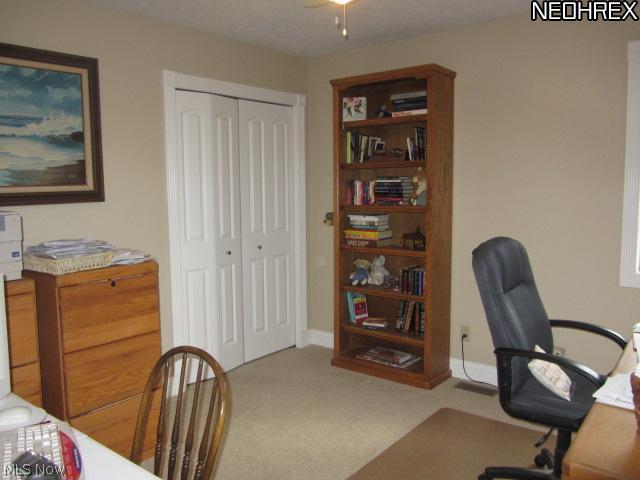 3839 Sandy Lake Road Ravenna, OH 44266 - Photo 19 of 23 This bedroom is currently the office. There are 3 bedrooms on the first floor and two full and one 1/2 bath on the first floor.