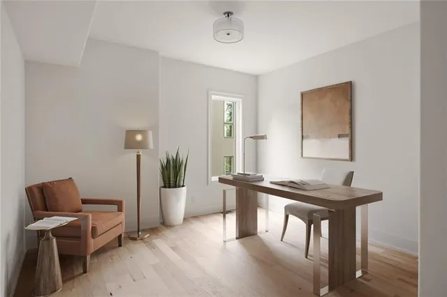 a view of a livingroom with furniture and window