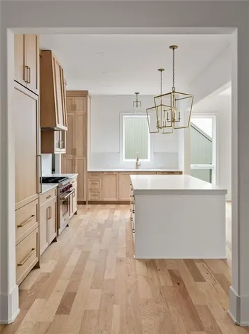 a view of a kitchen with windows