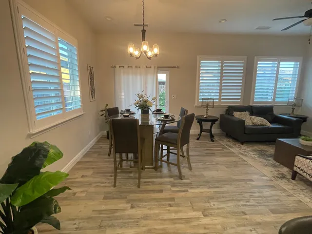a view of a dining room with furniture