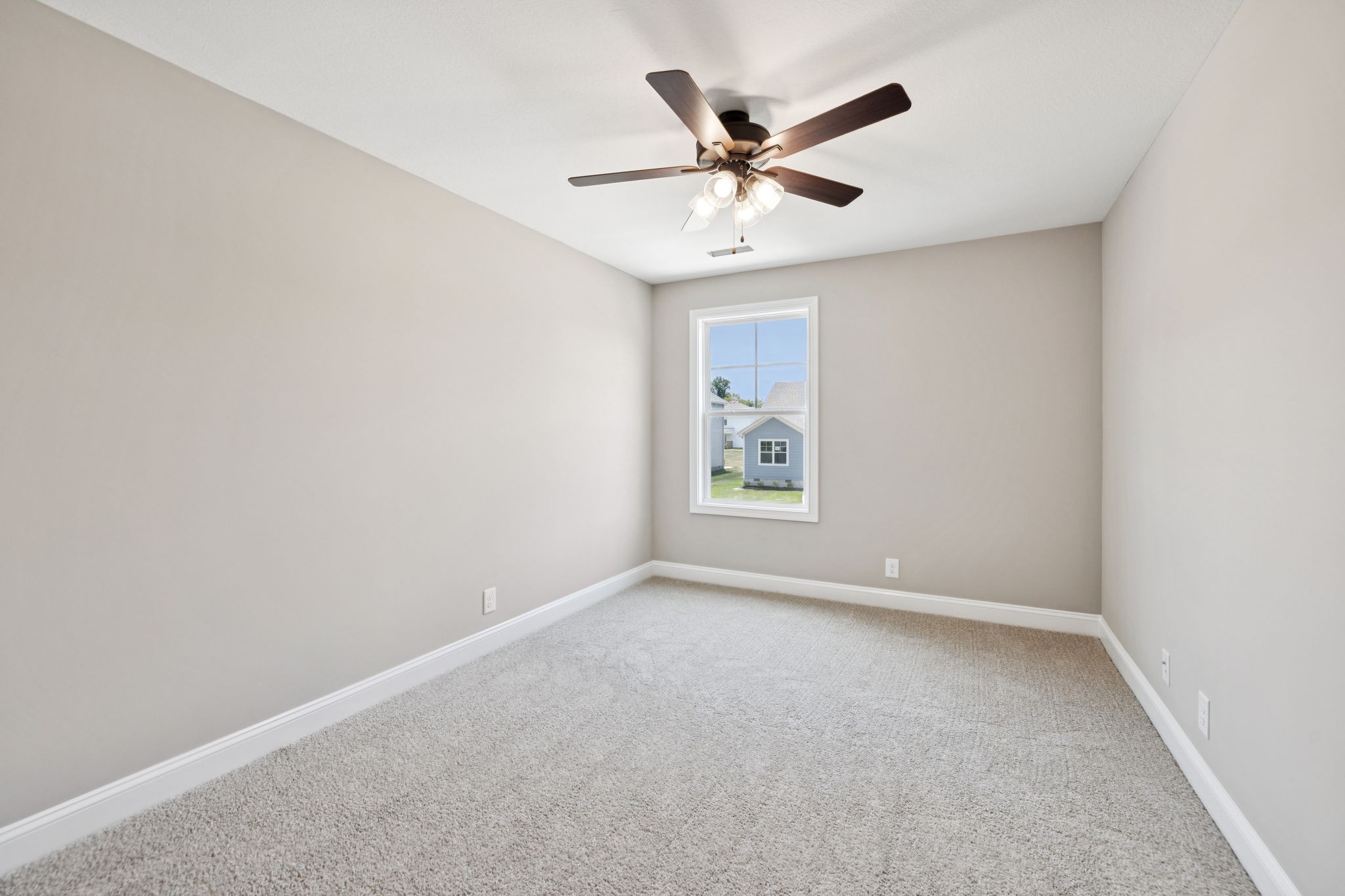 1304 Racker Drive Clarksville, TN 37043 - Photo 26 of 35 an empty room with windows and fan