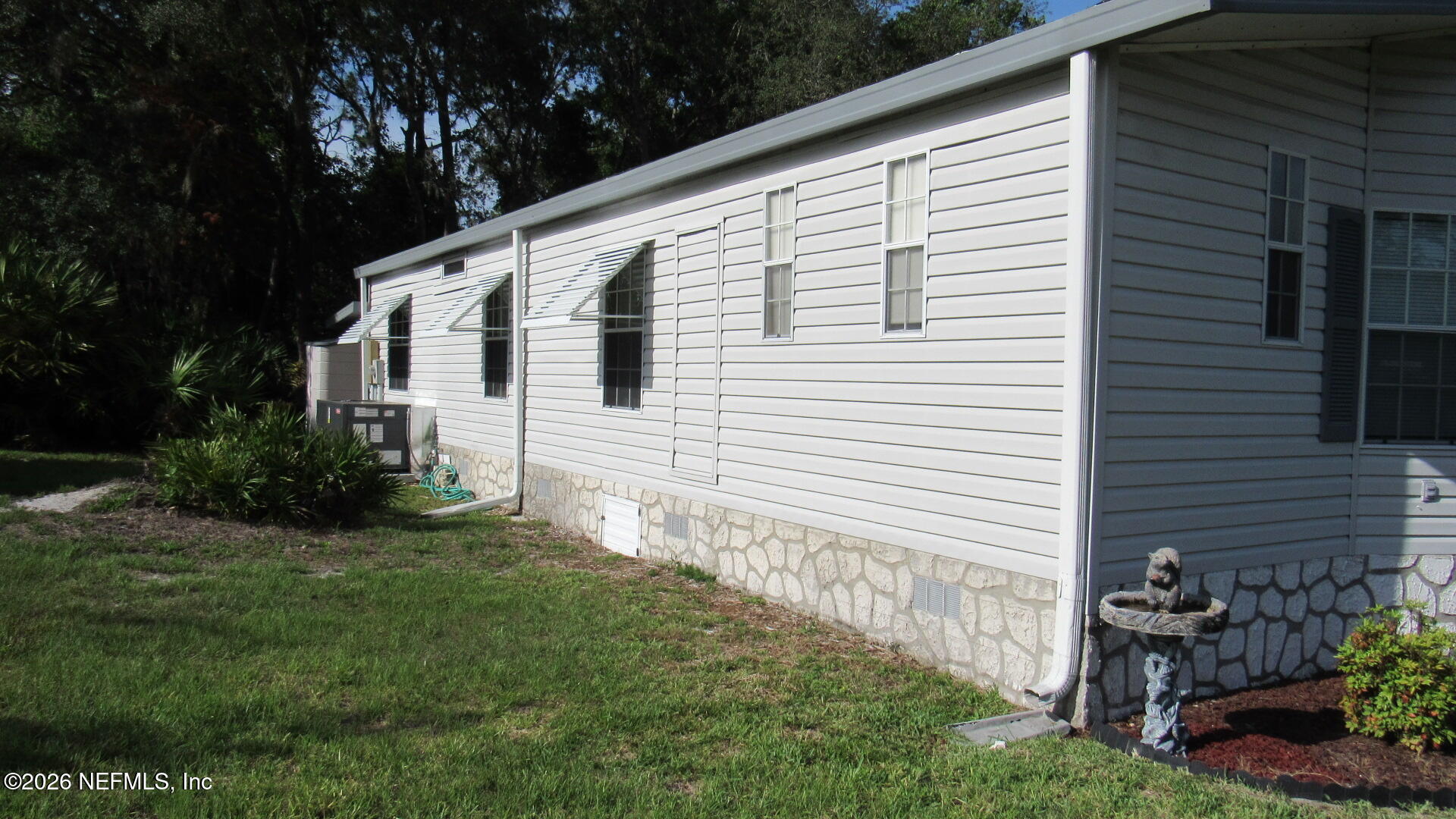 2103 Stacey Drive Mount Dora, FL 32757 - Photo 15 of 44 Cobb - Stacey Drive - exterior side left