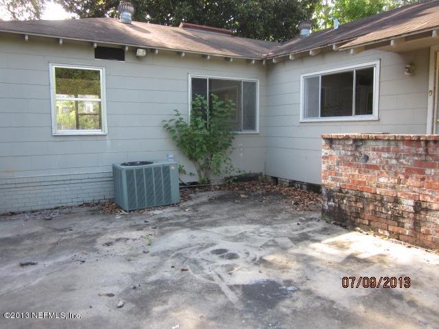 2452 Bayview Road Jacksonville, FL 32210 - Photo 3 of 14 a view of a house with a yard