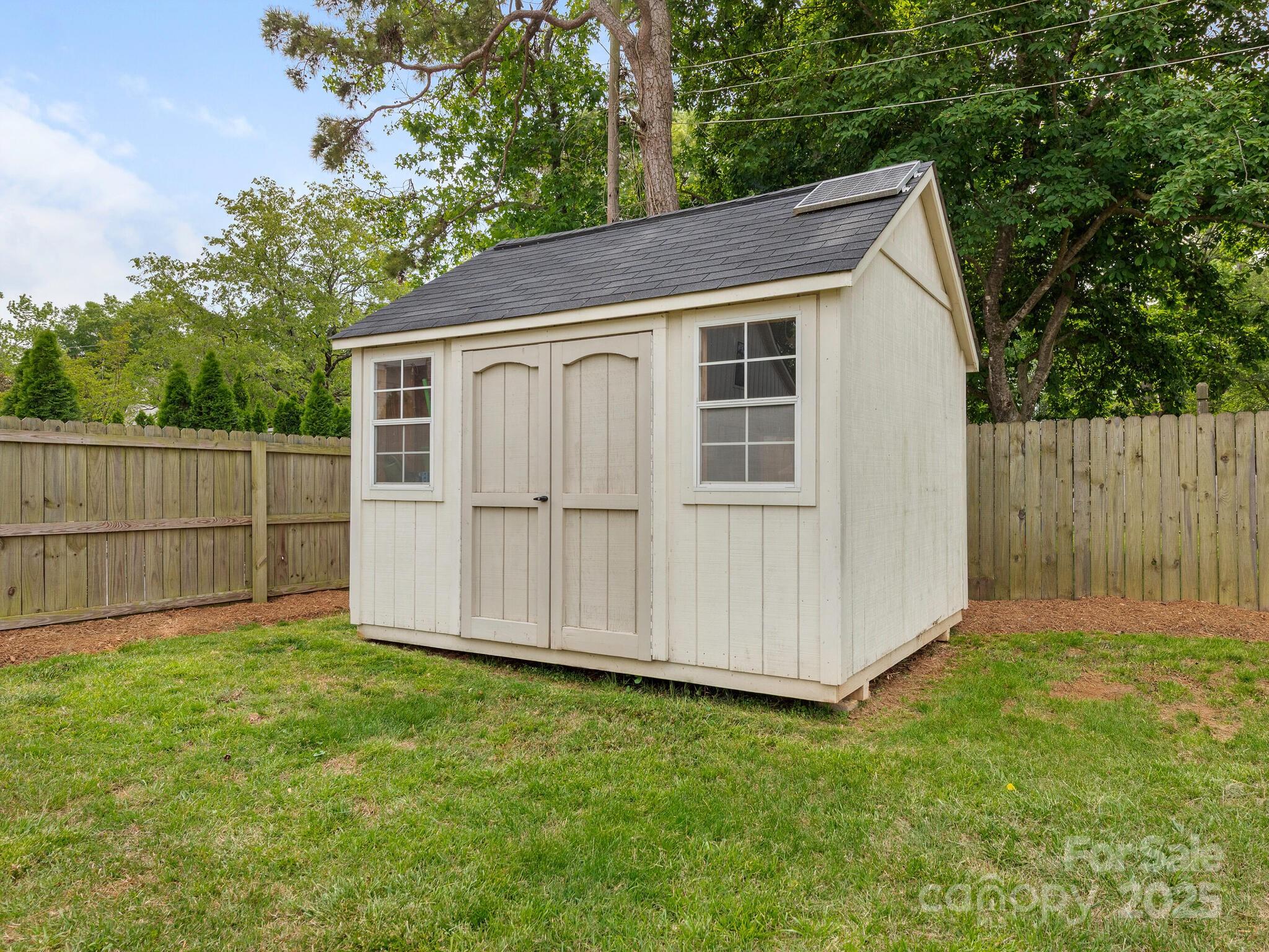 4346 Walker Road Charlotte, NC 28211 - Photo 29 of 30 a view of front of house with a yard