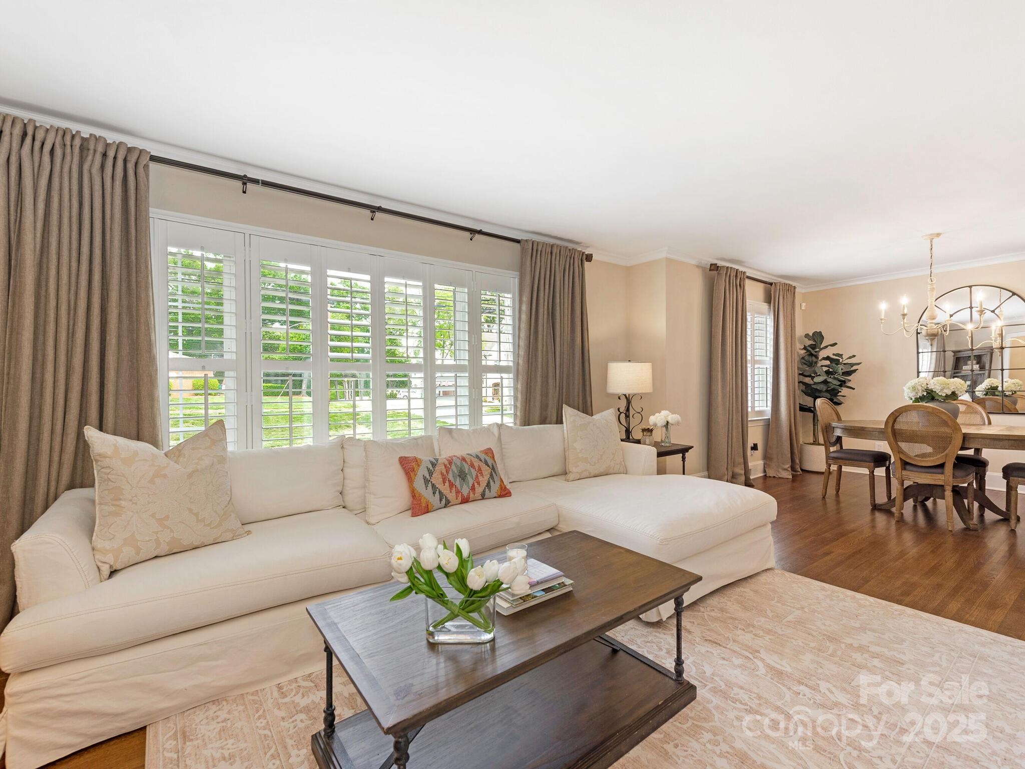 4346 Walker Road Charlotte, NC 28211 - Photo 5 of 30 a living room with furniture and a large window