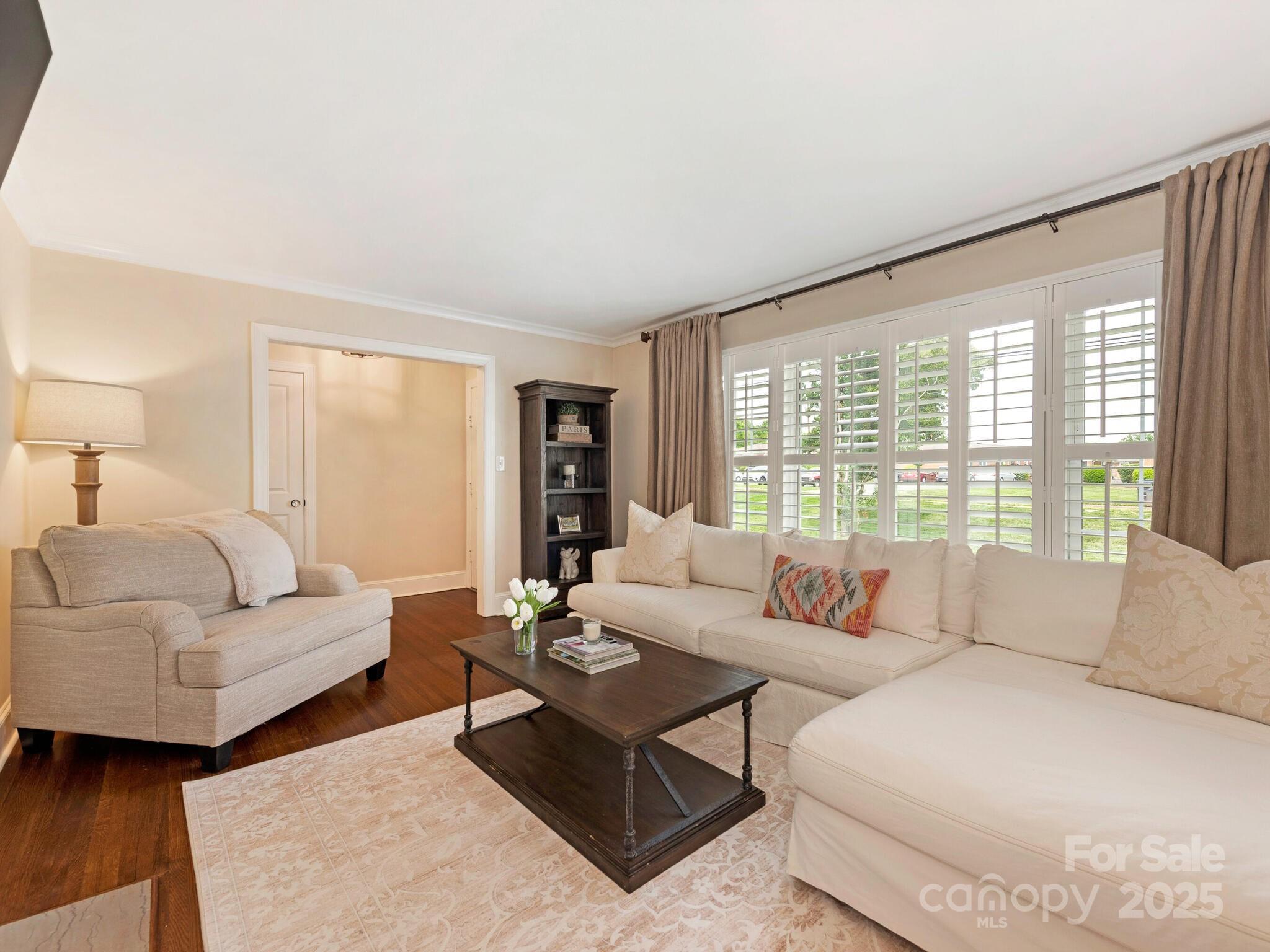 4346 Walker Road Charlotte, NC 28211 - Photo 6 of 30 a living room with furniture and a large window