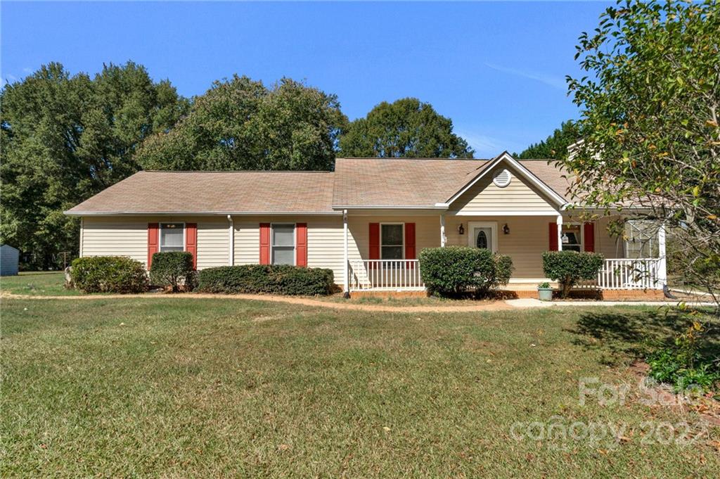 1414 Lighthouse Avenue Fort Mill, SC 29708 - Photo 1 of 47 a front view of a house with a yard